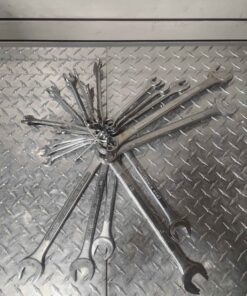 Metric wrenches ranging in size from 7 to 32 mm including 10 and 12 mm