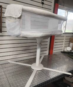 Adjustable height swiveling Bassinet