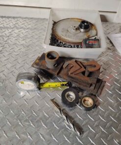 Stanley tape measure etc in margarine container