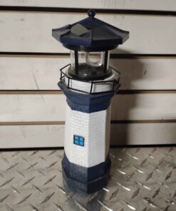 Solar light house with rotating beacon