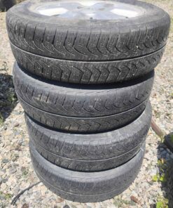 185/65 15 tires on aluminum rims...off a Nissan