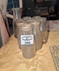 "The Producers Dairy" & assorted dairy bottles