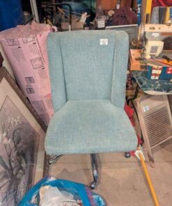 Blue studded Upholstered swivel chair