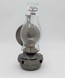Oil lamp with metal wall bracket