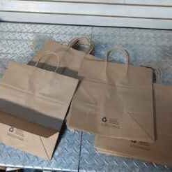 Approximately 50 paper bags