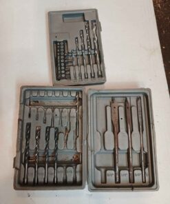 Assorted wood , metal , concrete and driver bits