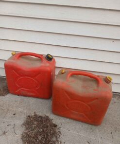 2 older fuel cans
