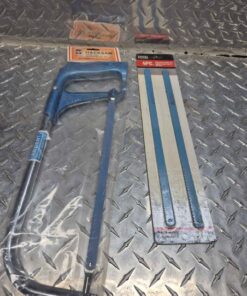 Hack saw with extra package of blades