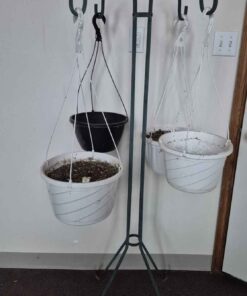 Metal plant stand with pots