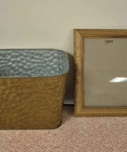 Metal waste can and hardwood picture frame