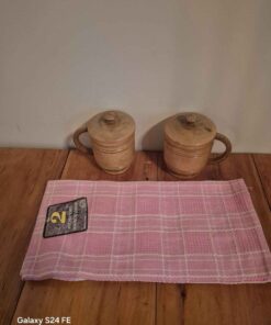 2 covered wood canister and towels