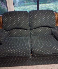 Fabric love seat in basement