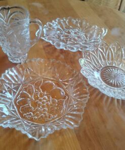 Cut glass pitcher and 3 cut glass serving ware
