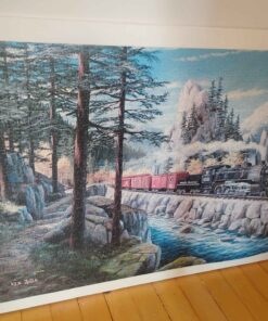 Framed train puzzle put together by Melvin