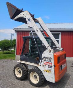 Bobcat S100 skid steer loader 4 cylinder Kubota liquid cooled diesel engine 2 speed joystick controls enclosed cab with heat