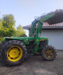 John Deere 2355 four-wheel drive loader tractor with 245 loader attachment and bucket slightly over 4000 hours