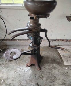 Antique Cream separator ...not into antiques would make a beautiful double tier flower planter/ stand