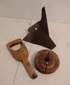 Antique plow point and wood handle and pulley