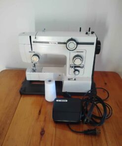 white sewing machine... working condition
