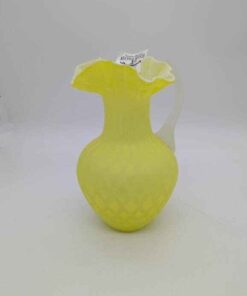 Yellow Ruffle edged pitcher with diamond pattern
