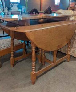 Gate leg Wooden dining table with two leaf extensions