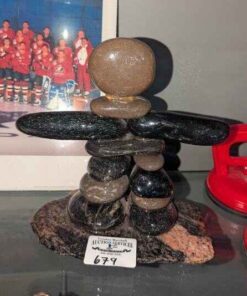 Stone Inukshuk statue