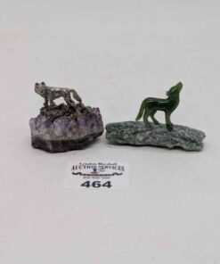 Miniature metal and jade wolf on amethyst & aggregate