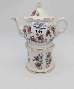 Tea pot for one and warming stand