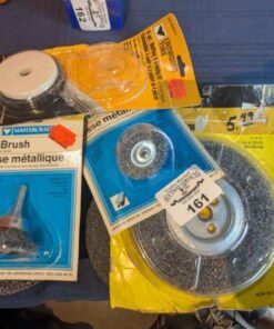 Assorted wire brushes and grinding wheel