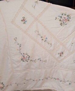 Bed Spread, pillows with ribbon floral pattern