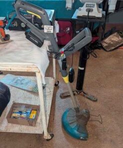 Cordless trimmer with battery and charging cord