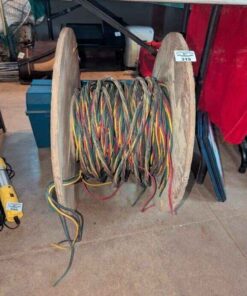 Wooden spool of multi-coloured wire