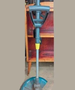 Cordless trimmer with 20v battery and charging cord