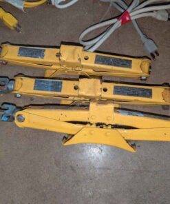 Yellow automotive scissor jacks