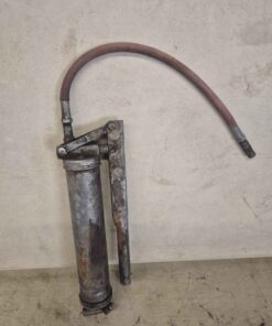 Lever action grease gun with whip hose