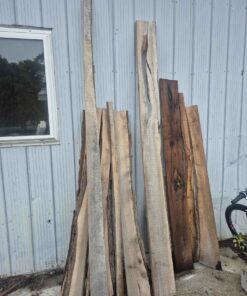 Assorted lengths of live edge and unique black walnut up to 8 feet long and longer