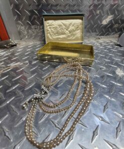 Pearls in Damaged case