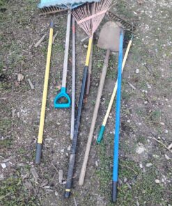 Approximately 7 garden tools and or handles