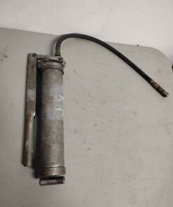 Lever action grease gun with whip hose