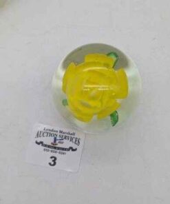 Blown Glass paperweight with yellow flower