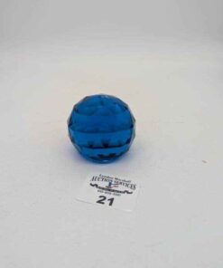 Faceted blue glass paperweight