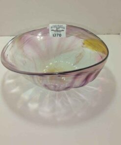 Hand blown art glass bowl with wavy optic ribbed sides in soft pink and yellow