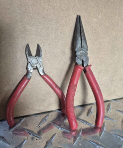 Red side cutters and needle nose pliers