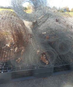 A number of partial rolls of chicken wire mesh. It all sells as a single lot