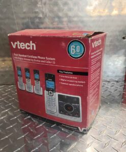 V tech set of 4 cordless phones..... open package headphones appear non used some of the bases have some dirt