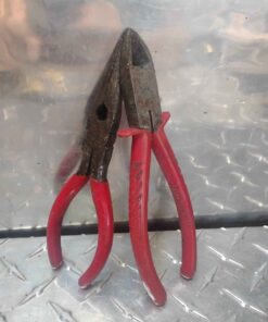 Red handled side cutters and needle nose pliers