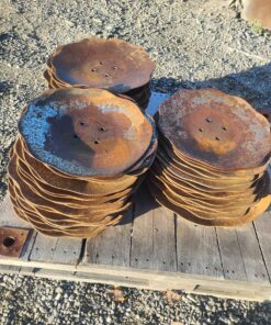 3 stacks of cultivator discs