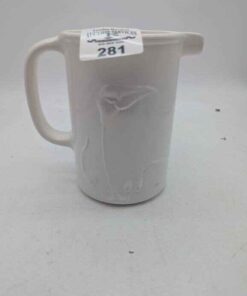 White Ceramic Canada 4604 pitcher with raised Calla Lily design